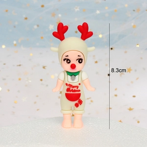 Christmas angel doll in reindeer costume with red heart antlers for cake decoration