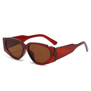 Retro geometric cat eye sunglasses with dark red frames and brown tinted lenses