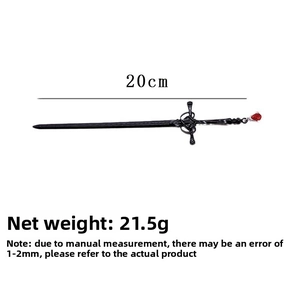 Detail of 20cm sword hair stick with red gemstone inlay and intricate handle texture
