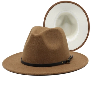Detail of wool fedora hat showing contrast brim lining and leather belt buckle