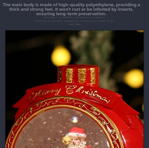 Detail of red Christmas snow globe with Merry Christmas gold text and Santa figure