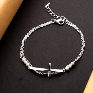Minimalist double-layer silver cross bracelet with white freshwater pearls and lobster clasp