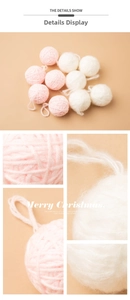 Detail of pink and white plush yarn balls with hanging loops for Christmas DIY decor
