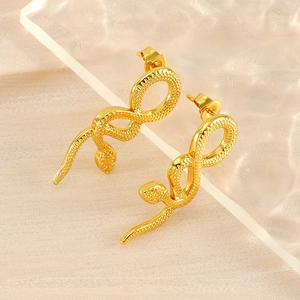 Chic 18K gold-plated snake stud earrings with realistic scale texture on acrylic stand