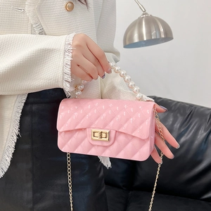 Pink quilted jelly bag with pearl handle and golden chain strap for women
