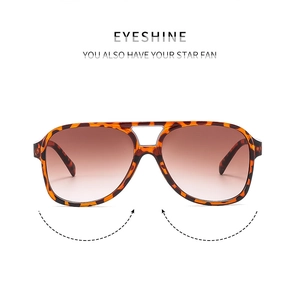Detail of tortoise shell aviator sunglasses with double bridge and gradient lenses