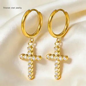 Titanium steel gold hoop earrings featuring a zircon-encrusted cross pendant