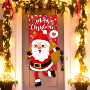 Bannière de Noël avec Père Noël suspendue sur une porte en bois avec lumières festives