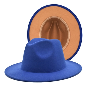 Detailed macro view of the royal blue wool felt fedora with a contrasting camel lining