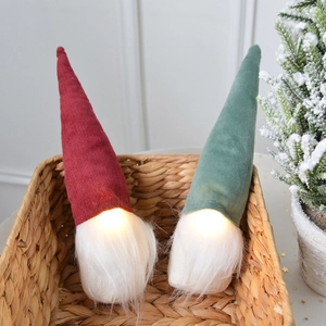 Lighted Christmas gnomes in velvet hats with long beards for holiday tabletop decor