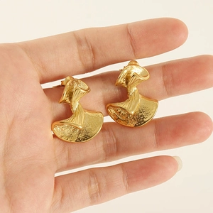 Irregular textured gold stainless steel earrings with vintage hammered fan design