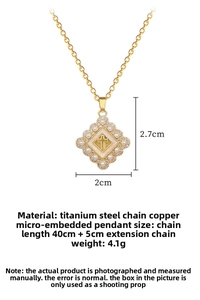 Detail showing 2.7cm x 2cm gold cross pendant dimensions on titanium steel chain