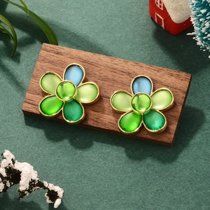 Elegant gold flower earrings with green and blue petals for Christmas and New Year