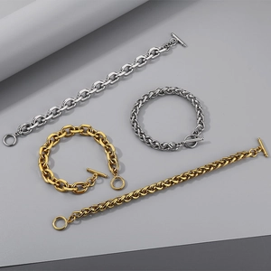 Detail of stainless steel O-chain bracelets with OT toggle clasps in gold and silver
