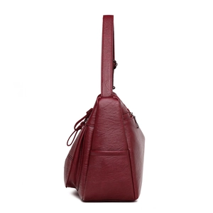 Burgundy faux leather shoulder bag for middle-aged women with a pebbled grain finish