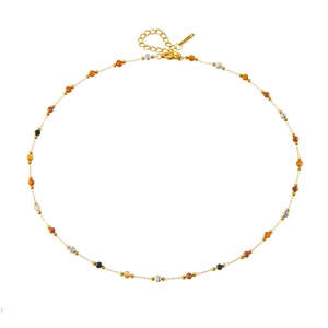 Retro stainless steel gold chain bracelet featuring colorful beads and lobster clasp