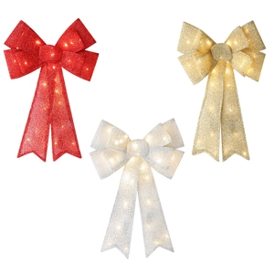 Three-piece set of large LED Christmas bows in red, silver, and gold with warm light