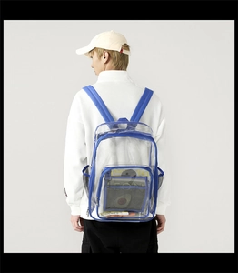 Detail of transparent waterproof PVC backpack showing blue trim and mesh side pockets