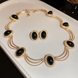 French vintage black gold oval jewelry set with necklace and stud earrings