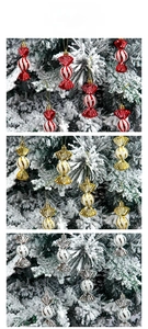 Close-up of shiny Christmas candy ornaments in red gold and silver with glitter finish