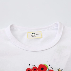 White cotton boys' long sleeve t-shirt with floral embroidery and jumping meters label