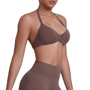 Seamless brown halter neck sports bra and high-waisted leggings set for gym yoga workout