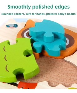 Close-up of smooth polished edges and thick wooden pieces of animal 3D puzzles