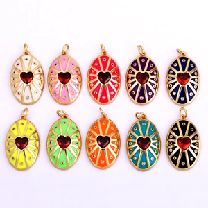 Oval heart pendants in colorful enamel finishes with centered red gems and gold plated rings