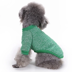 Detail shot of the green waffle knit texture on this warm winter puppy sweater