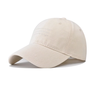 Side view of beige cotton baseball cap featuring professional letter embroidery detail