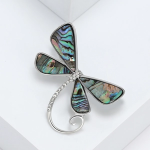 Elegant dragonfly brooch crafted with natural abalone shell and sparkling rhinestones