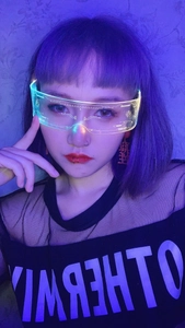 Cyberpunk LED glasses with dual side glow and neon light patterns for music festivals