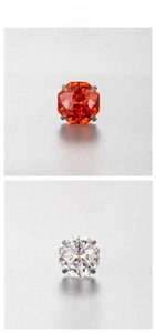 Detail view of 6mm octagonal orange zircon and clear crystal stud earrings in titanium steel