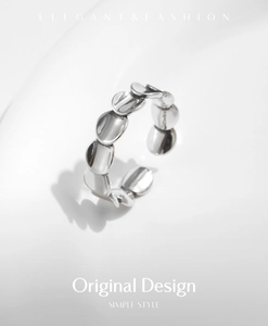 Macro shot of silver S925 irregular scale ring with elegant and simple original design