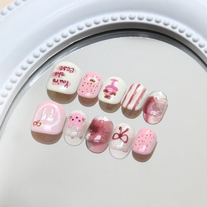 Pink rabbit and bow cartoon press-on nails with 3D stripes and cat-eye shimmer