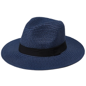 Detailed view of navy blue straw sun hat showing fine woven texture and black ribbon