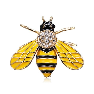 Elegant gold bee brooch with sparkling rhinestones and yellow enamel detailing on white background