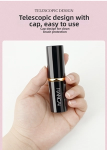 Detail of the RANCAI retractable makeup brush with a sleek black tube and protective lid
