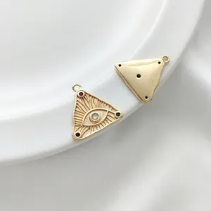 14K gold plated evil eye triangle pendants with colorful zircon inlay on white ceramic