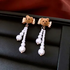 Elegant 18K gold plated pearl bear drop earrings with bow detail for women fashion