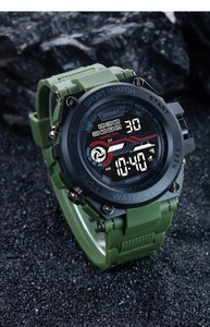 Army green digital sport watch with silicone strap on a professional dark stone background