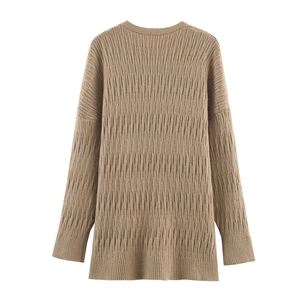 Detail of earthy brown long cardigan back showing heavy knit texture and vertical stripes
