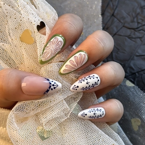 3D floral embossed almond press-on nails in forest green, ivory white, and vine patterns