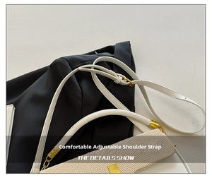 Detail view of woven color-block handbag showing adjustable leather strap and gold hardware