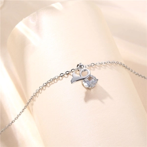 Elegant titanium steel necklace featuring a silver mermaid tail and round zircon pendant