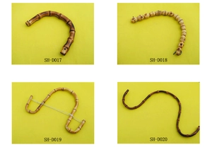 Detail of four natural bamboo handles and hooks in styles SH-D017 to SH-D020 for handbags