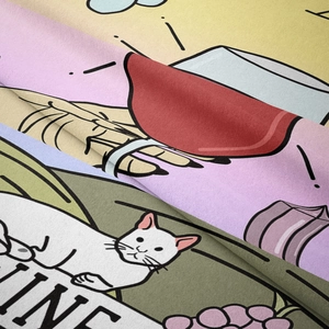 Detail of high-quality flannel fabric showing soft texture and colorful cat wine print