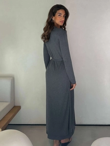 Detailed back view of dark grey long-sleeve knit dress with matching waist belt