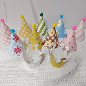 Detailed set of cartoon party hats with pompoms and gold crowns for birthdays