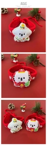 Detail of handmade red knit Christmas collars for cats and dogs with festive charms